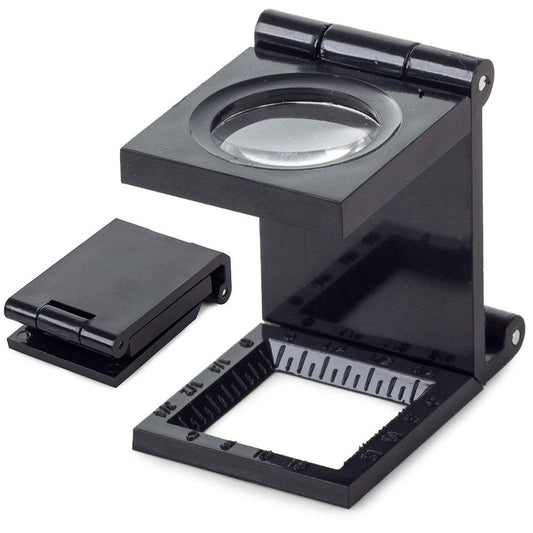 Palielināmais stikls - juveliera lupa uz statīva