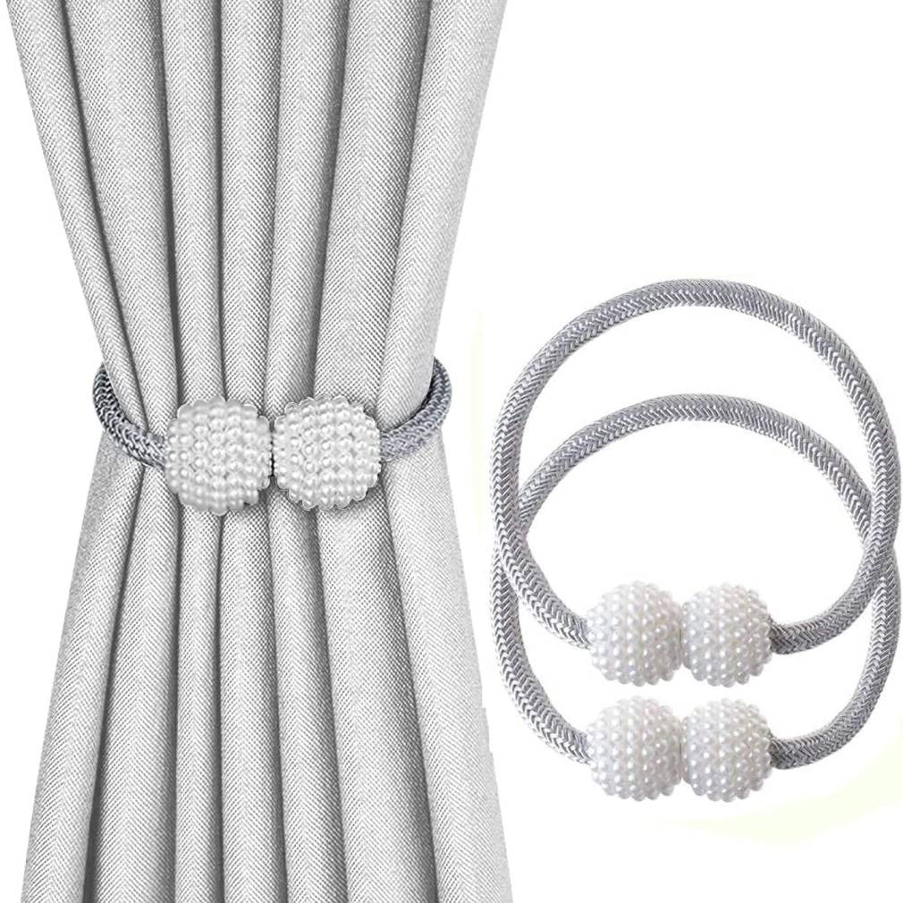 Magnētiskā aizkaru sprādze