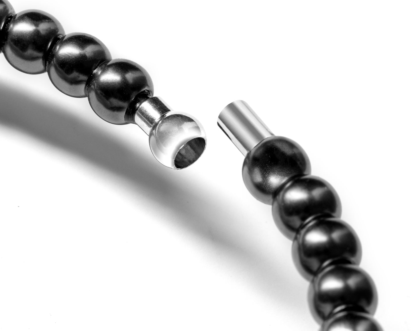 Pērļu kaklarotas vīna turētājs - MELNS