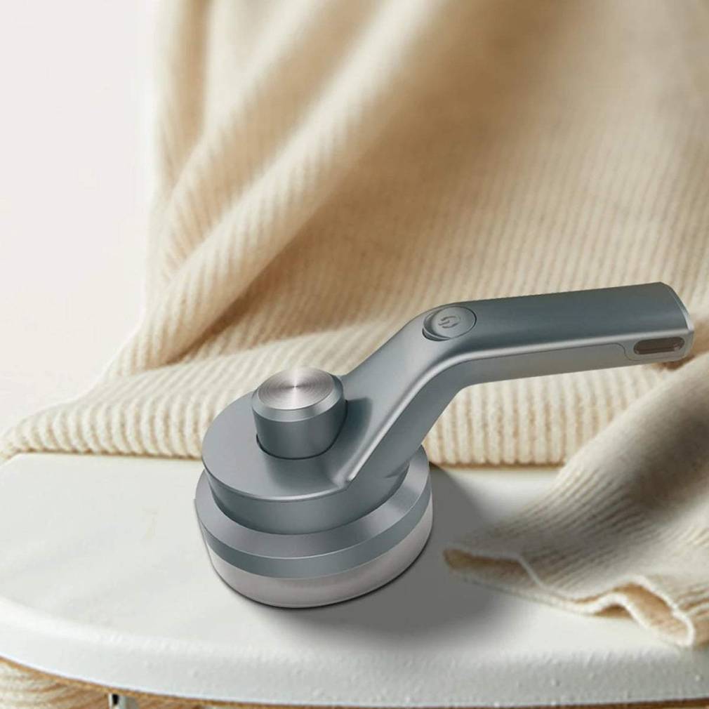 Apģērba pūku noņēmējs