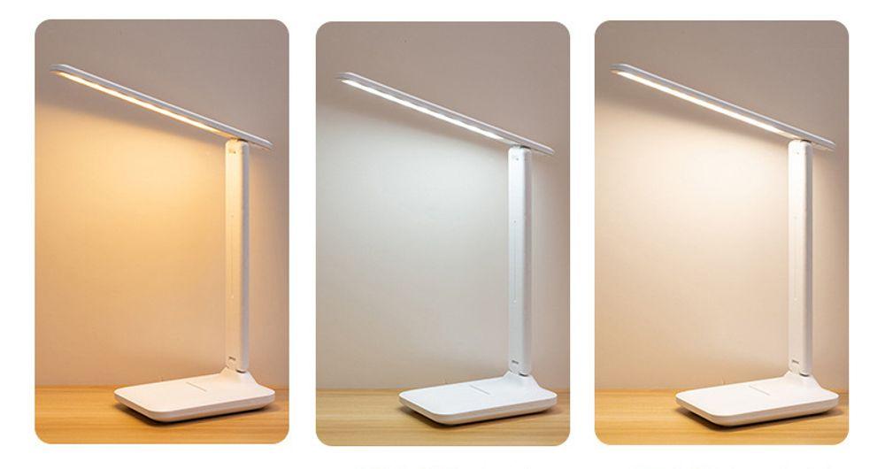 Galda lampa ar telefona turētāju