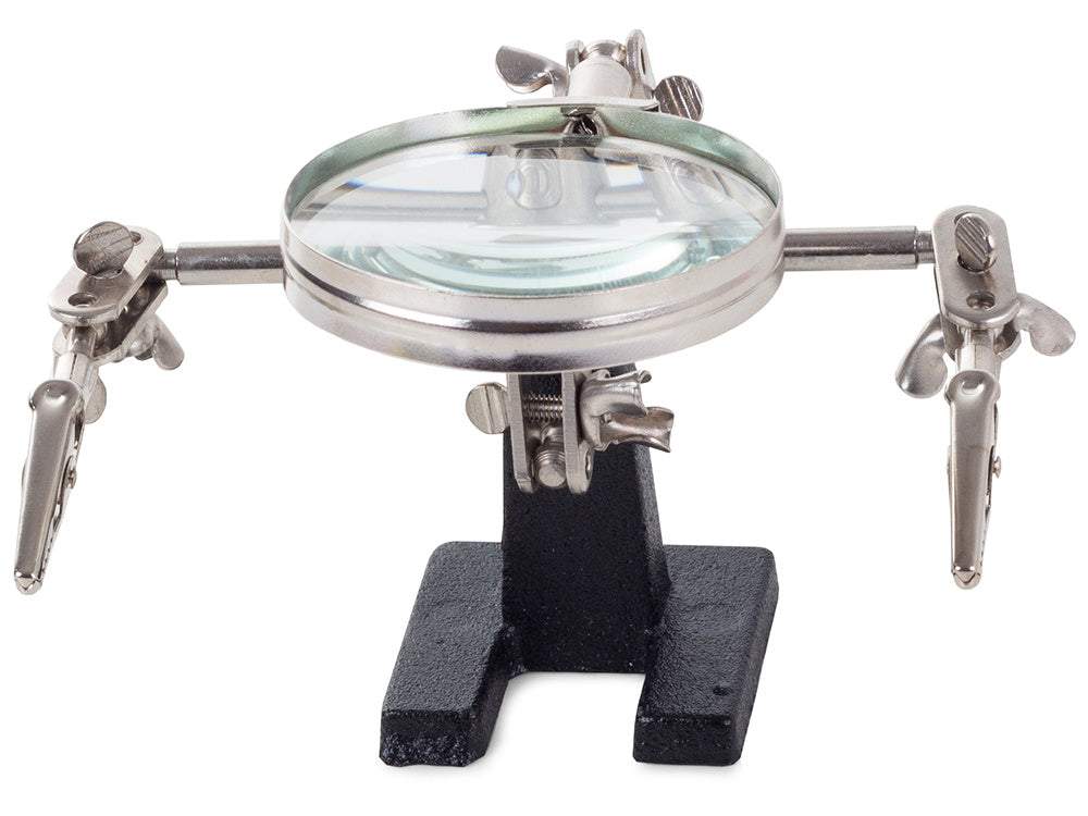 Palielināmais stikls ar turētājiem