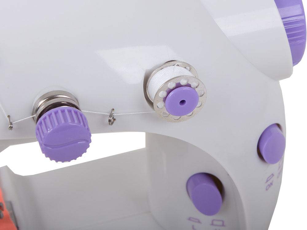 Elektriskā mini
šujmašīna