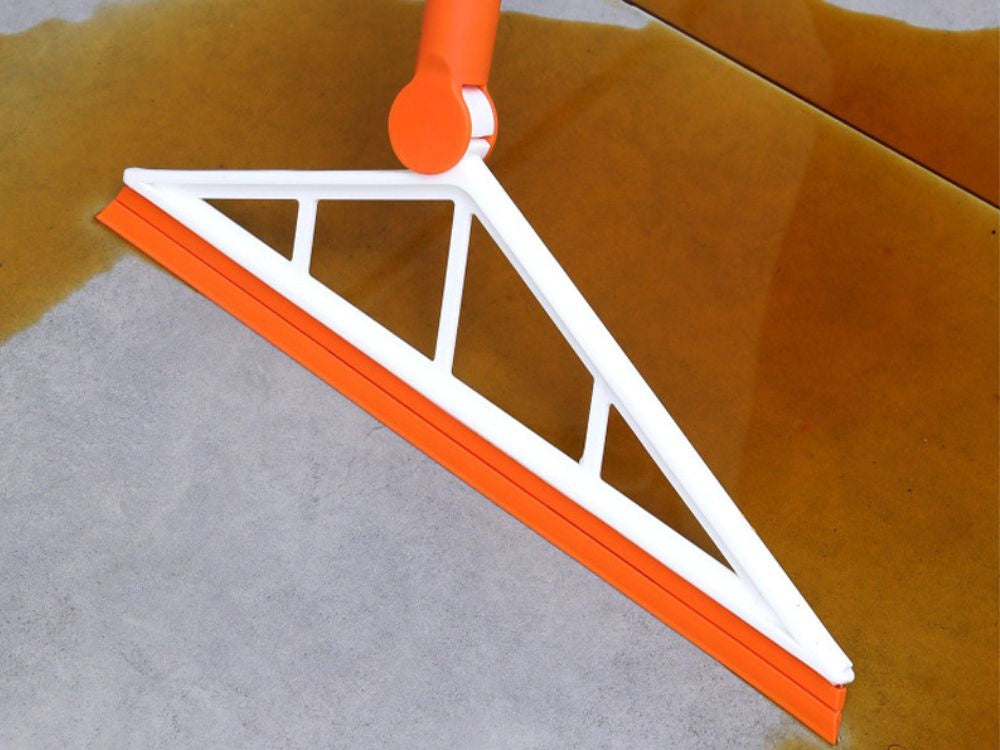 Silikona slota ūdenim un citiem netīrumiem ar garu stienīti "Magic"