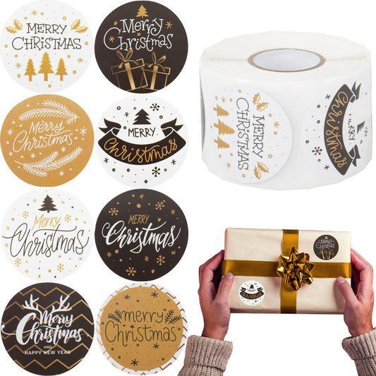 Ziemassvētku dekoratīvās uzlīmes 500 gabalu rullī "Priecīgus Ziemassvētkus"
