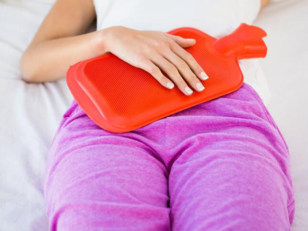 Termosildītājs gumijas vēdera sildītājā ar mīkstu ieliktni