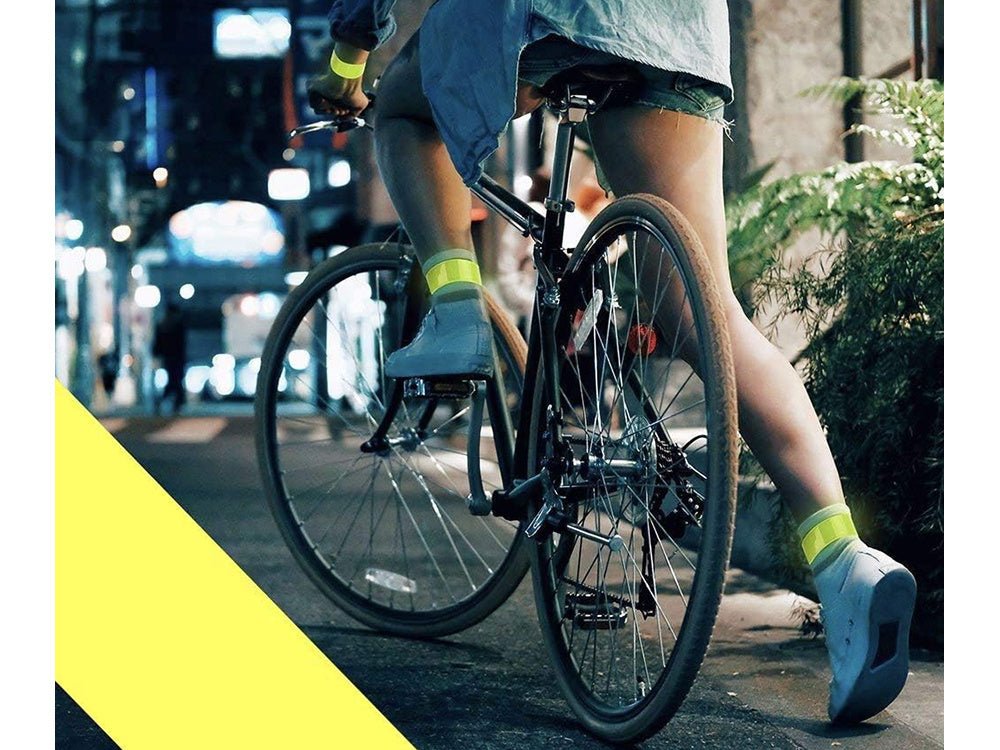 Pašbloķējoša atstarojoša skriešanas aproce ar atstarojošu siksniņu