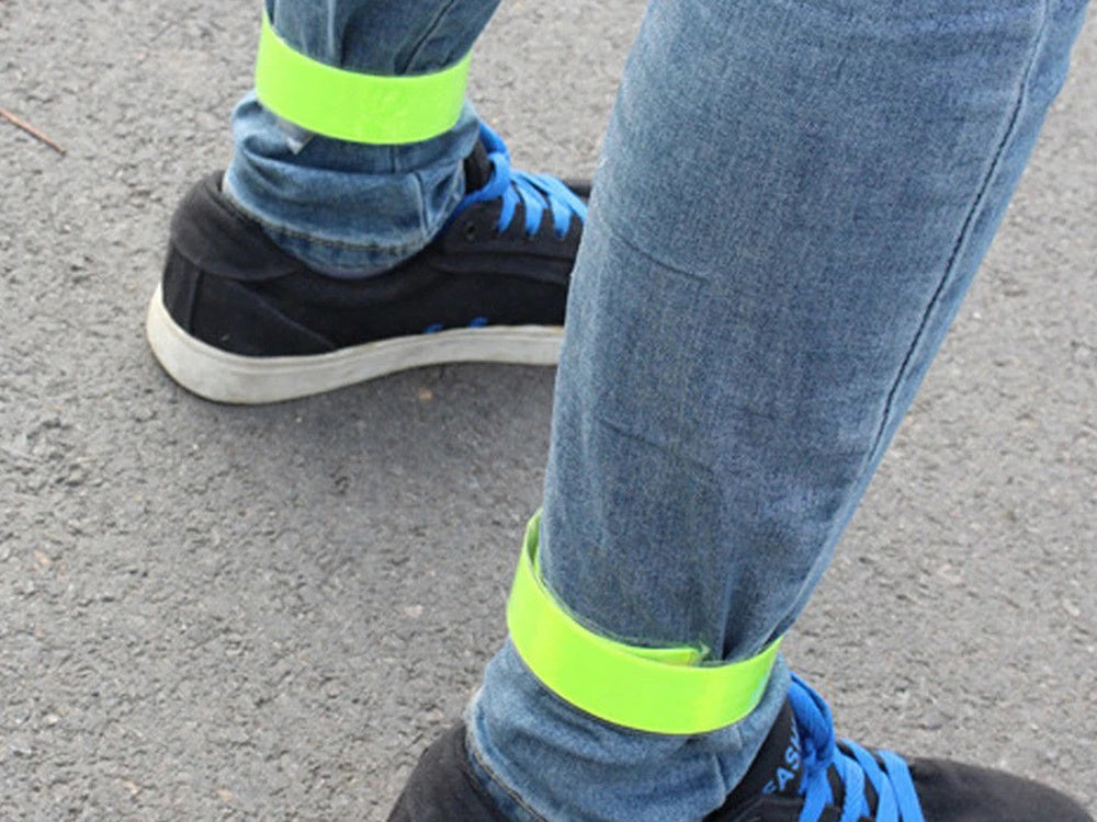 Pašbloķējoša atstarojoša skriešanas aproce ar atstarojošu siksniņu