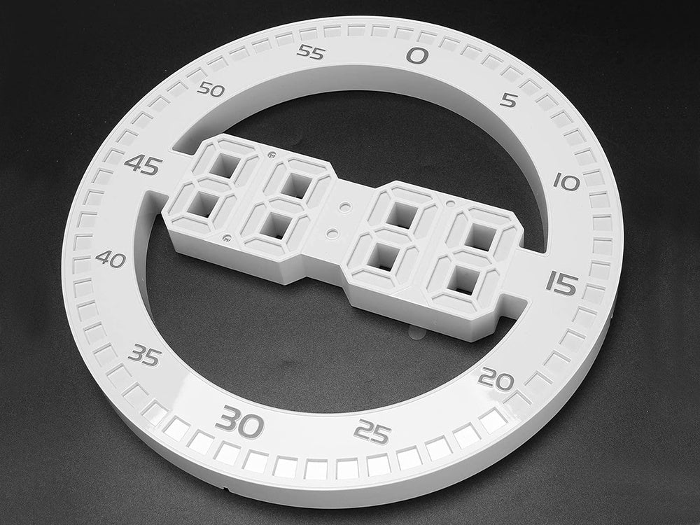 Modinātājpulkstenis ar vadītu elektronisku termometru un modinātāja fona apgaismojuma termometru