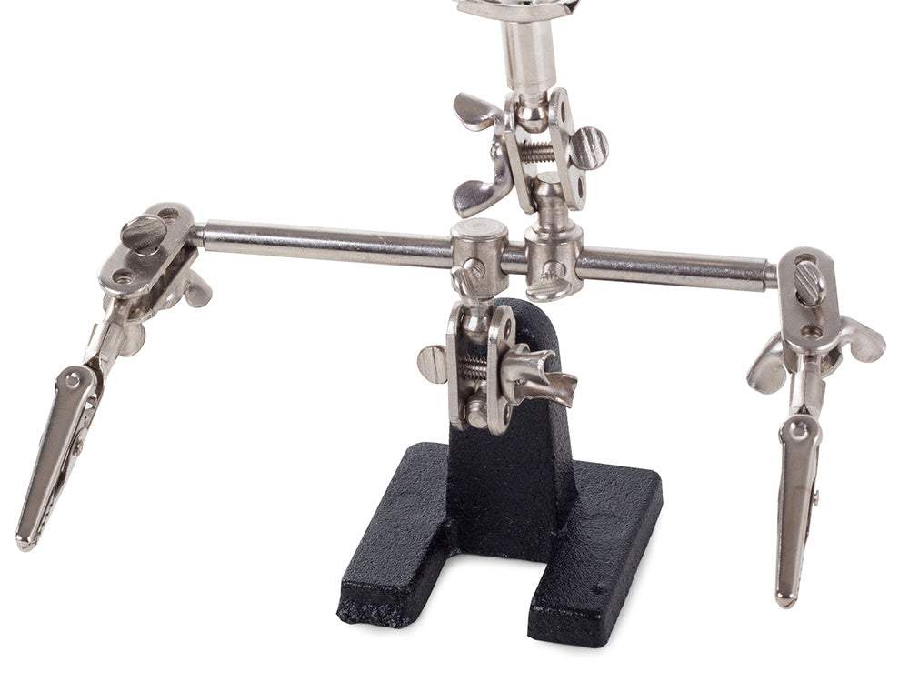 Palielināmais stikls ar turētājiem