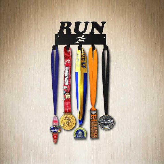 Medaļas āķis skrējējiem