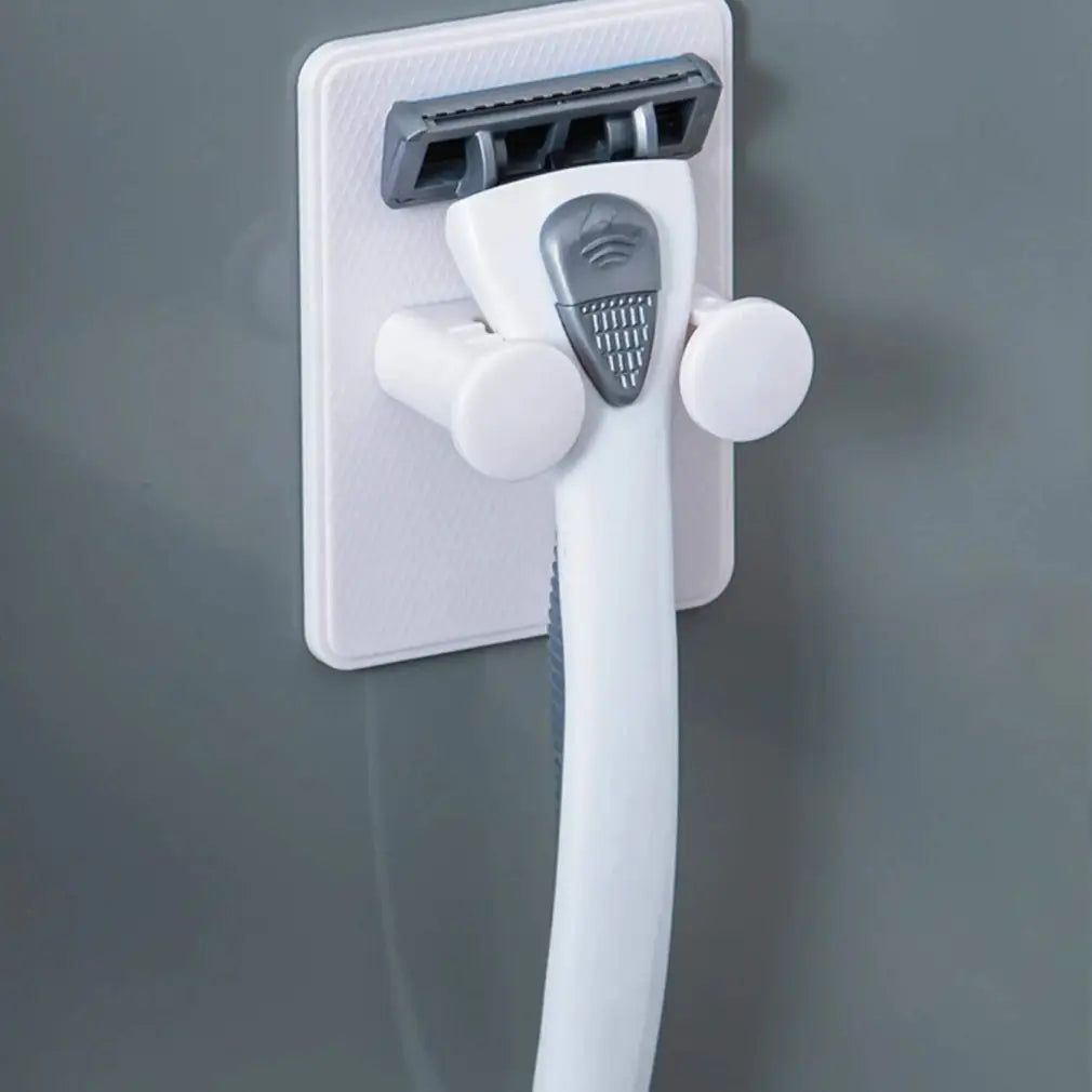 Līmējams lādētāja turētājs pie sienas