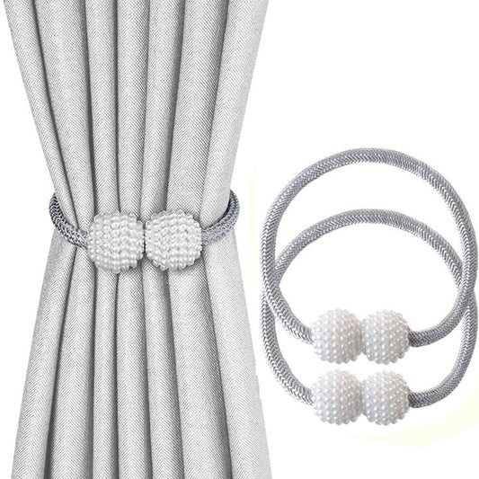 Magnētiskā aizkaru sprādze