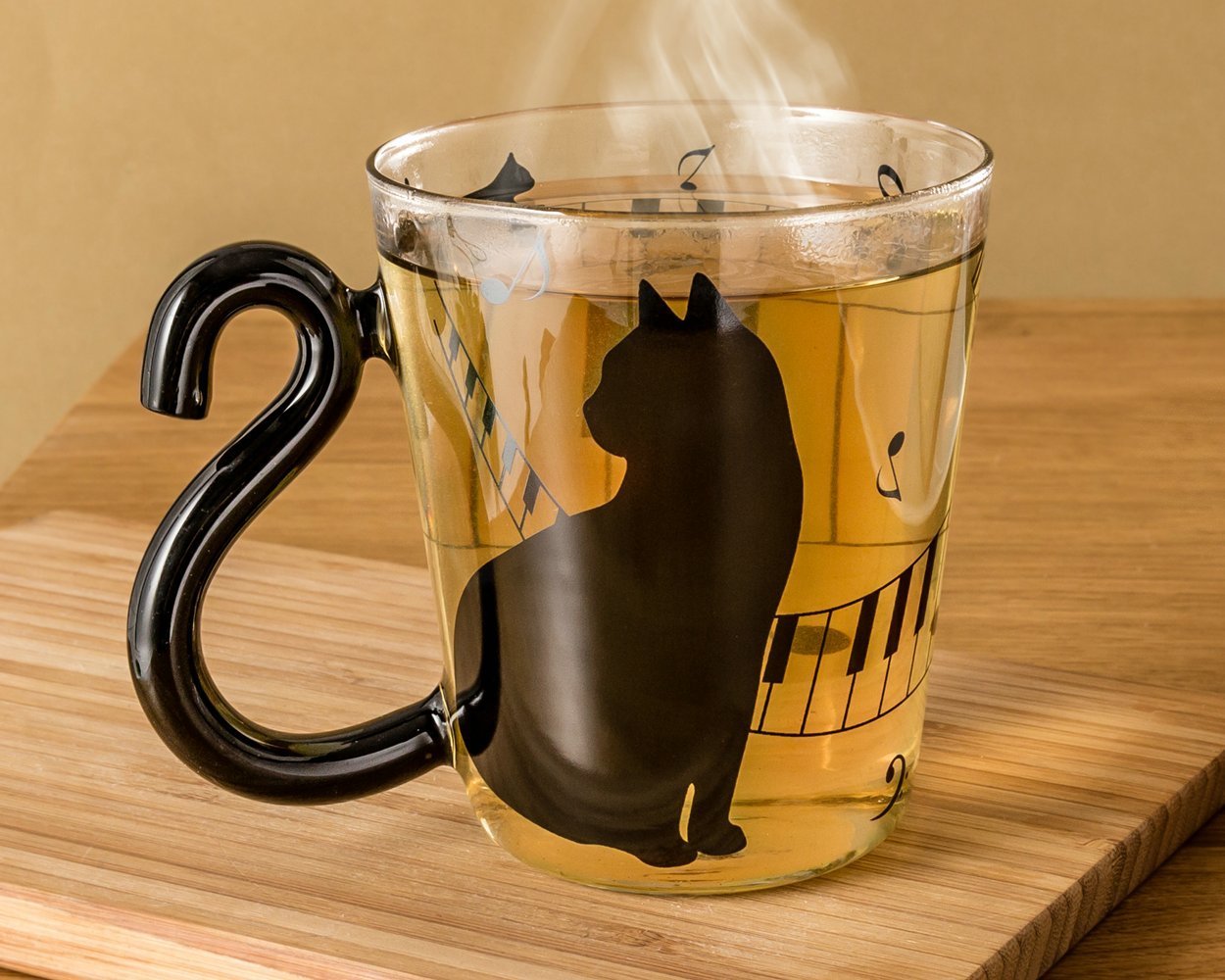 Kaķu glāze ar astes rokturi