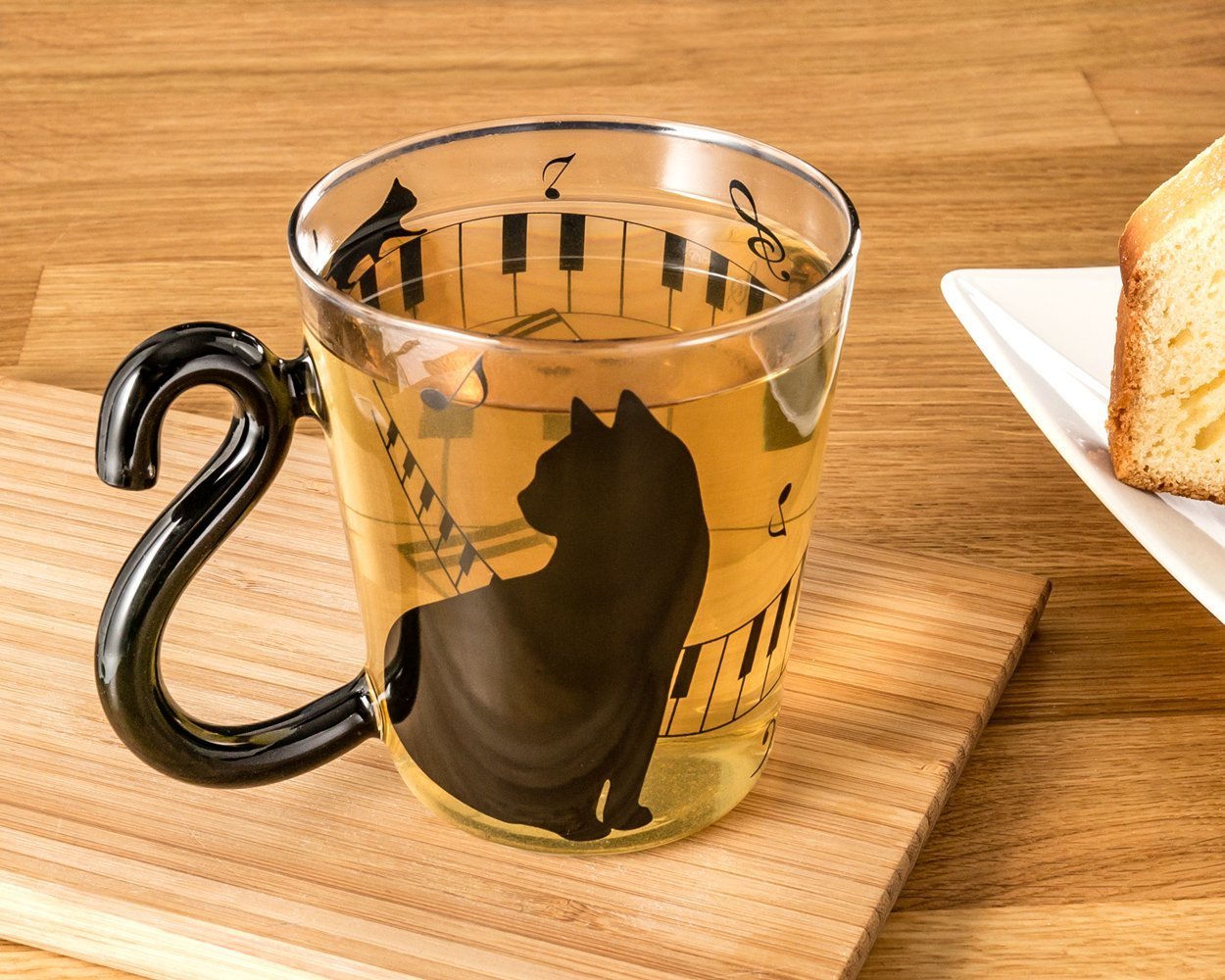 Kaķu glāze ar astes rokturi