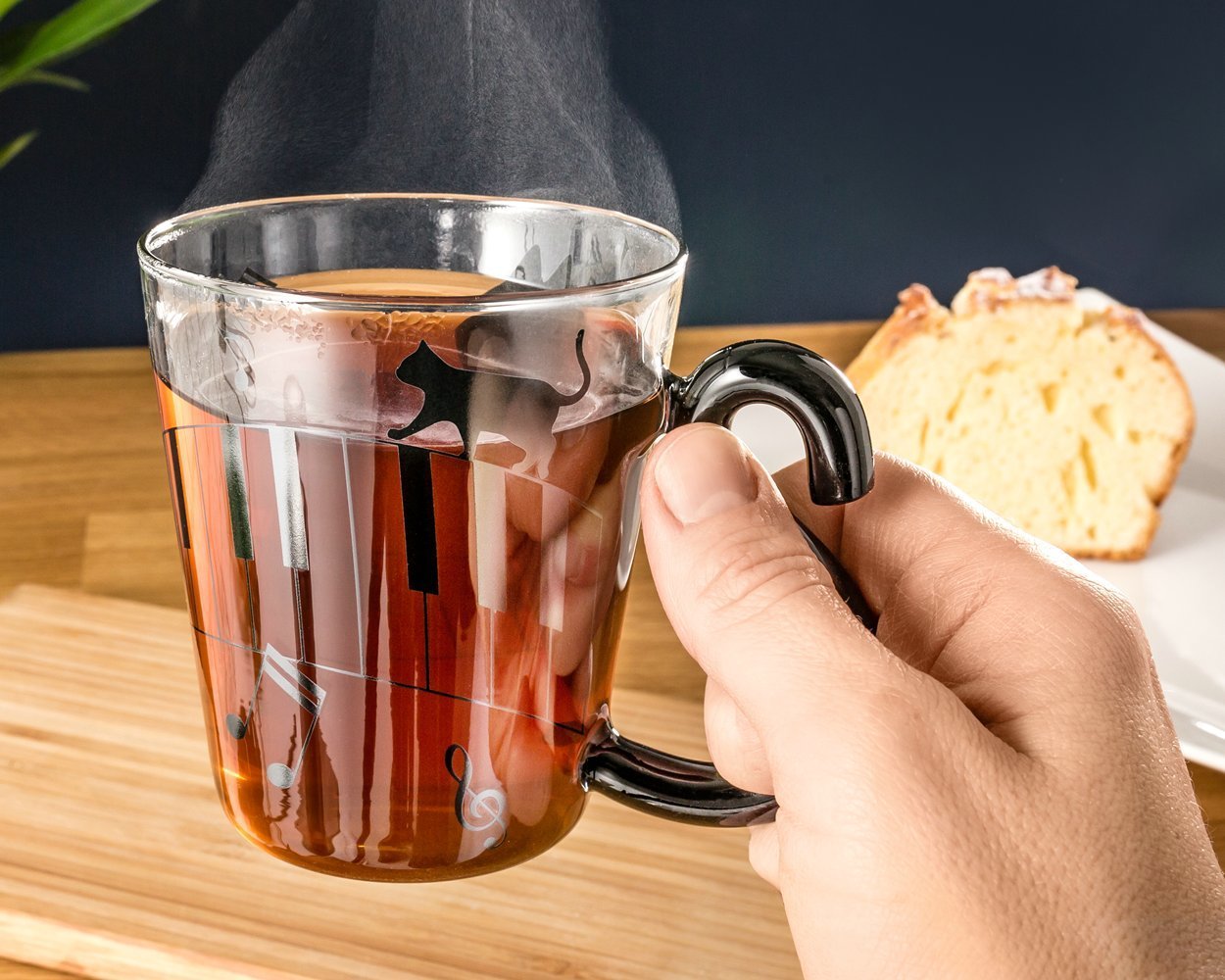 Kaķu glāze ar astes rokturi