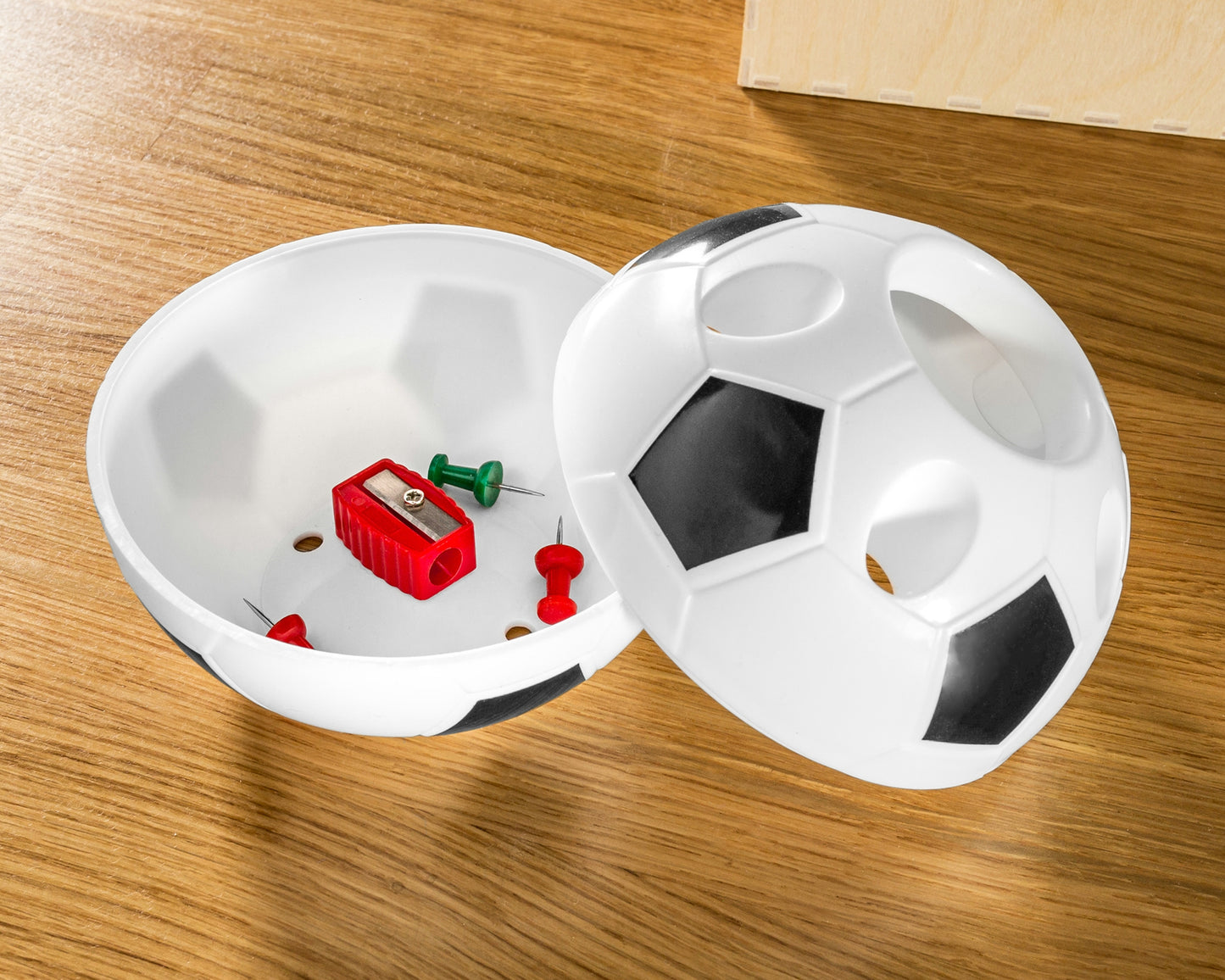 Futbola pildspalvu turētājs