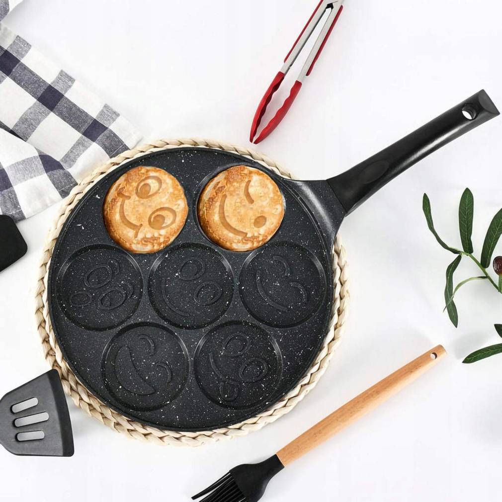 Pankūku panna ar dažādu emociju zīmējumiem