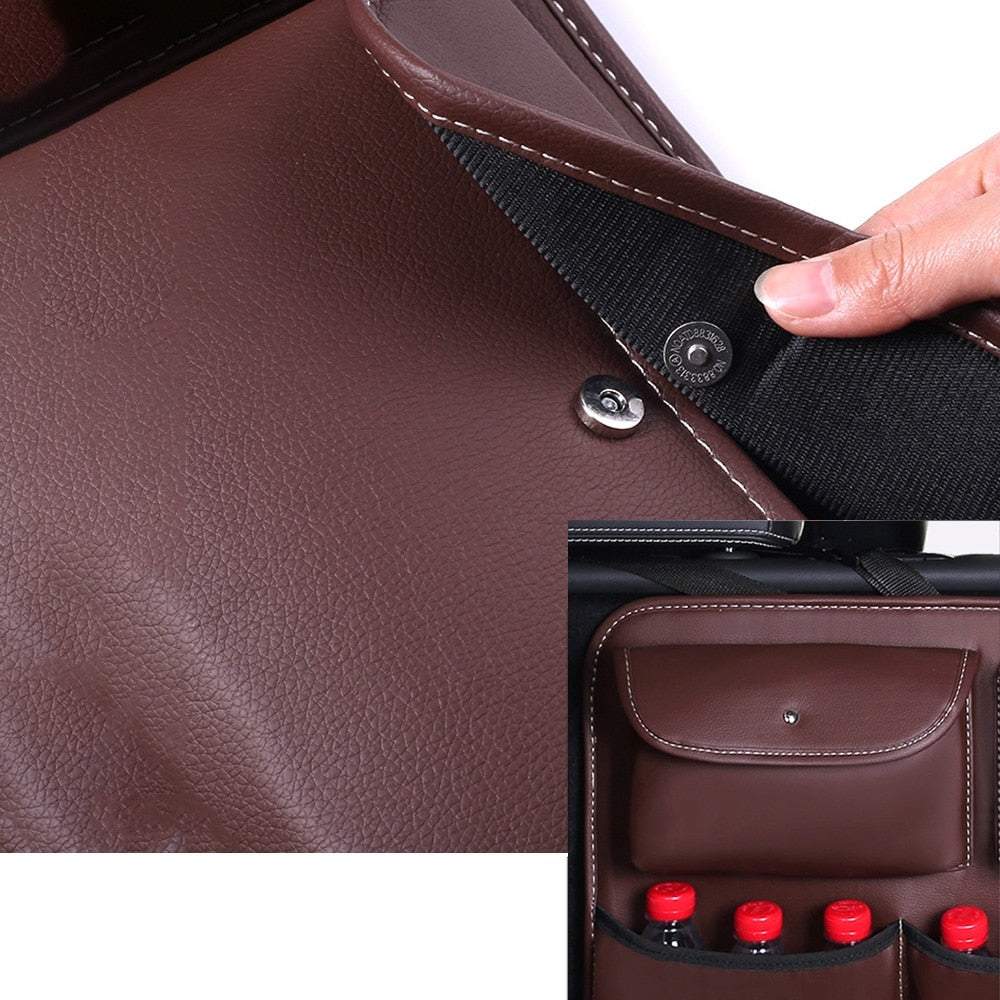 Mašīnas bagāžnieka organizators uz 3 trim sēdekļiem