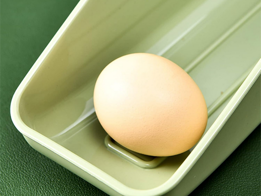 Olu kastes ledusskapja organizatora olu paplāte