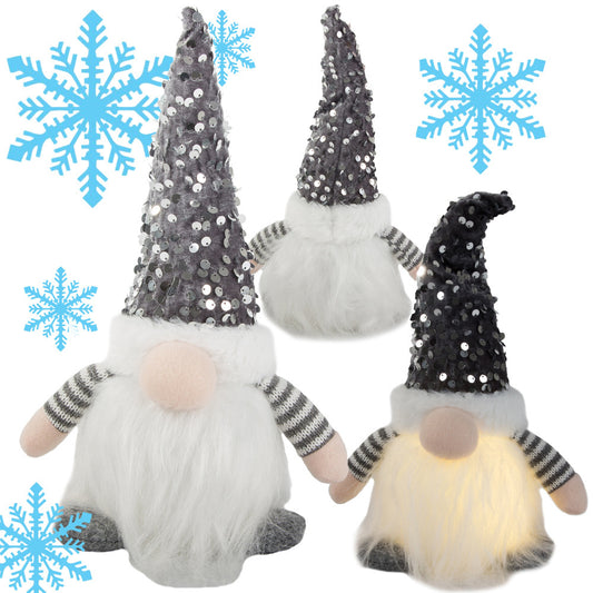 Rūķa rūķītis ar apgaismotu LED vēdera Ziemassvētku rūķīti zem Ziemassvētku eglītes