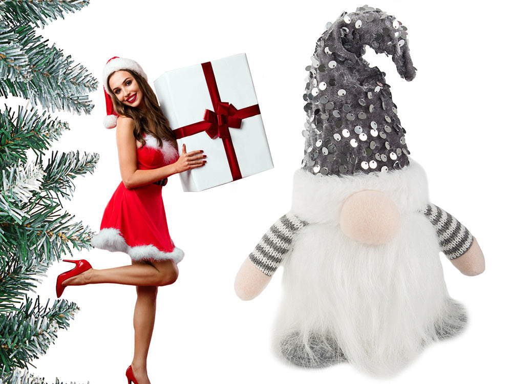 Rūķa rūķītis ar apgaismotu LED vēdera Ziemassvētku rūķīti zem Ziemassvētku eglītes