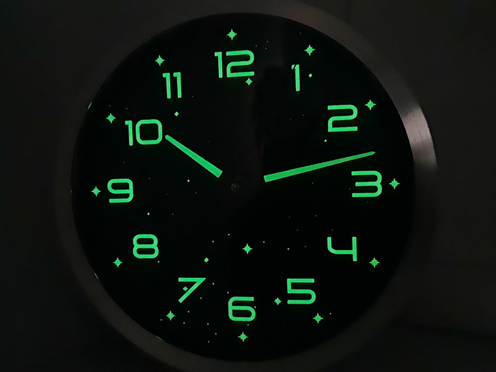 Fluorescējošs liels fluorescējošs sienas pulkstenis ar gaismas zvaigznēm 25 cm
