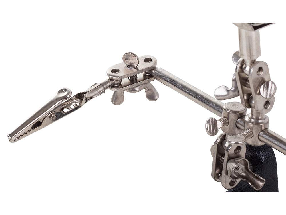 Palielināmais stikls ar turētājiem